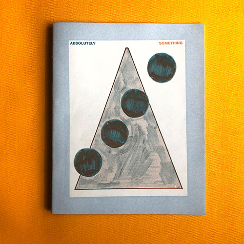 Zine cover showing a triangle with four circles running diagonally across it, surrounded by a blue border. 