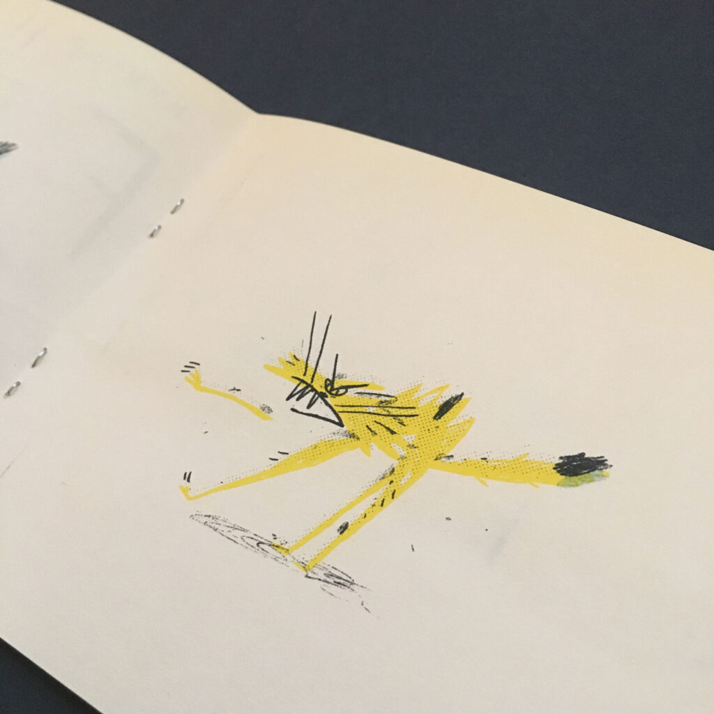 Zine page showing an illustration of an angry animal printed in yellow and black. 