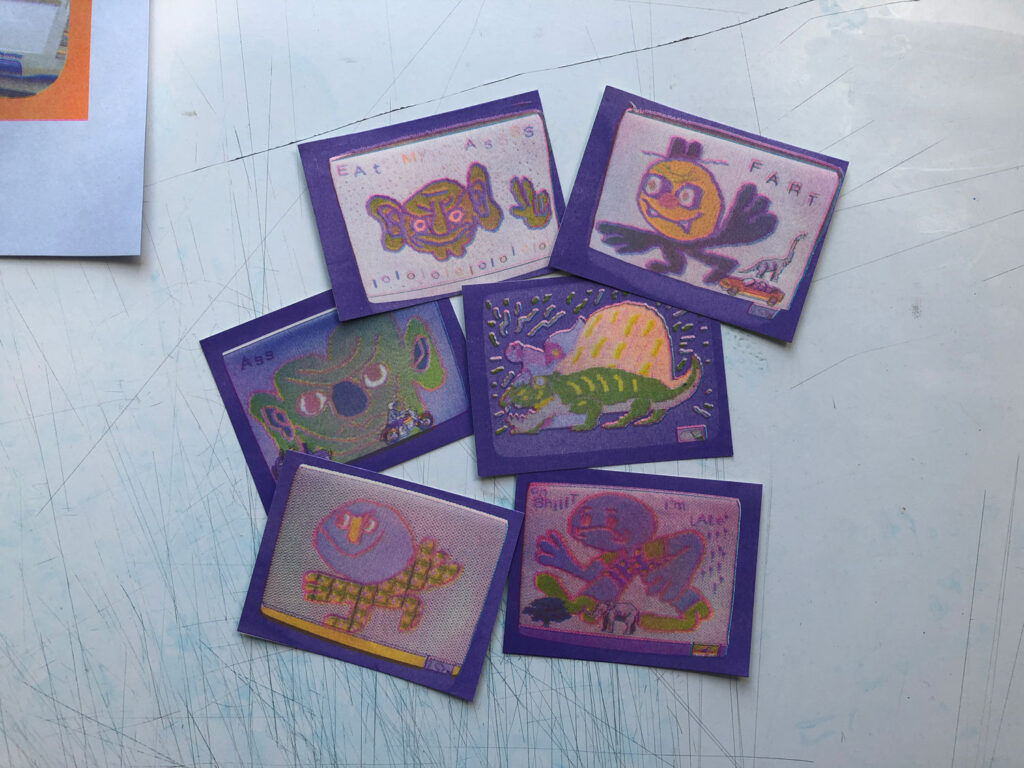 Various cards showing different illustrated characters and creatures. 