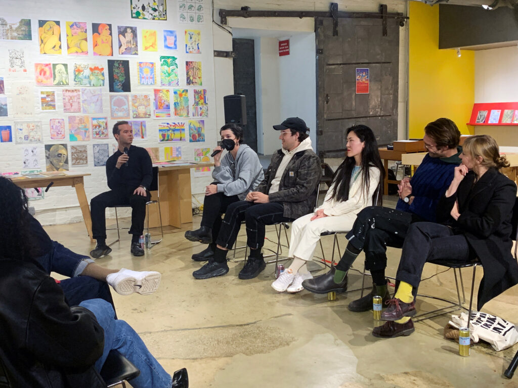 Photo of a panel discussion with Caroline Paquita-Kern, Robert Blair, Jinhee Han, Aidan Fitzgerald, and Kelli Anderson moderated by Panayiotis Terzis in the Printing the Future exhibition space.