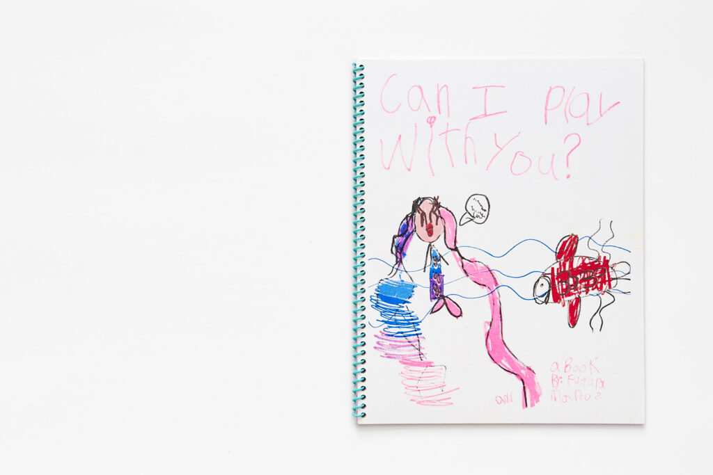 Cover of "Can I play with you?" by Futura and Marco Scozzaro, showing the title and drawing of a mermaid with pink and blue hair, and a red fish in the ocean, drawn by a child.