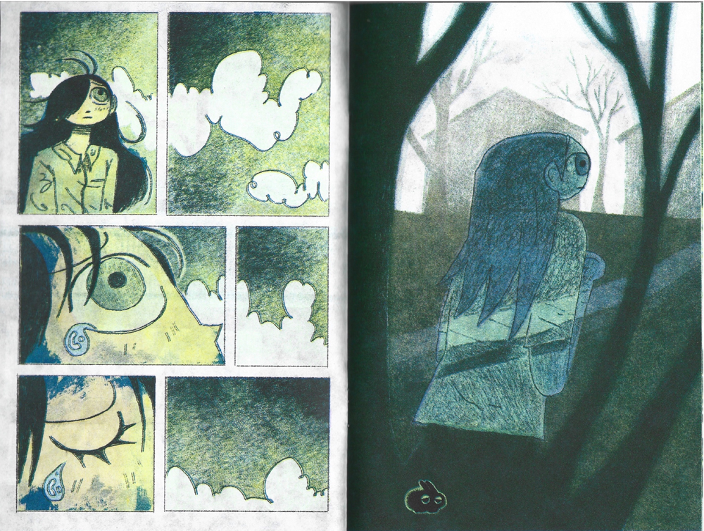 Double page comic spread showing a girl crying a single tear and looking at houses and trees. 