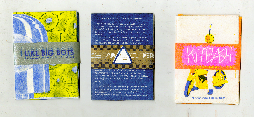 A set of three single sheet zines, one in blue and yellow, another in medium blue and gold, and a third in yellow, black and pink.