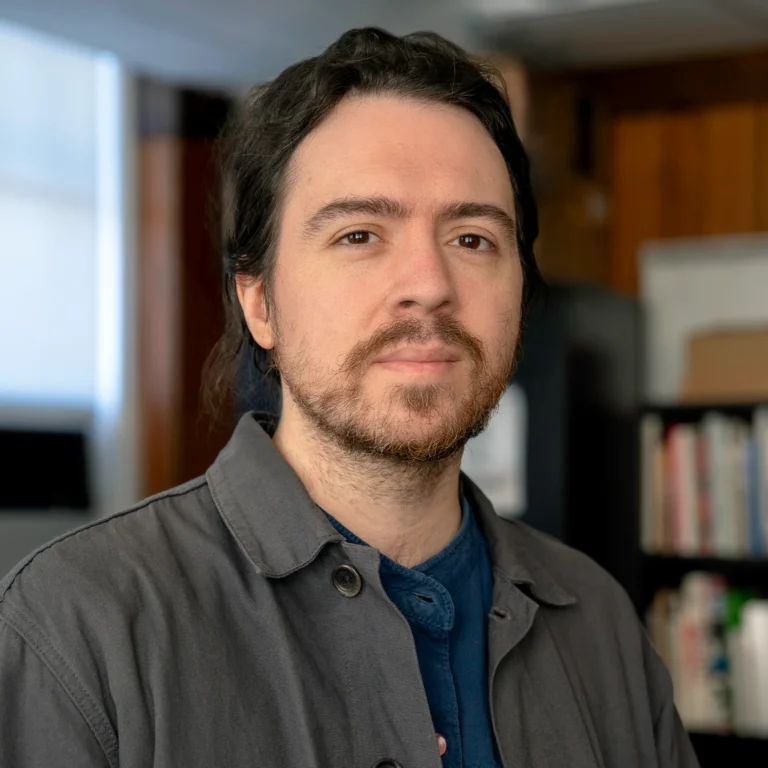 Photo of Travess Smalley, who has dark hair and facial hair.